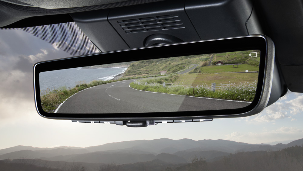 Close-up shot of auto-dimming smart rearview mirror with Homelink®.